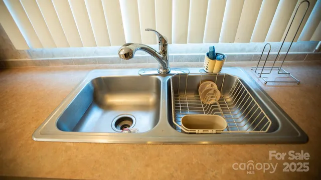 a close view of sink and a tap