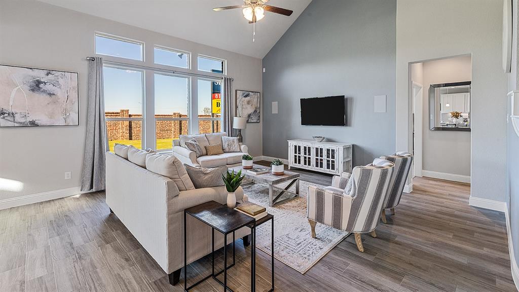 3280 Pier View Street Midlothian, TX 76065 - Photo 10 of 37 a living room with furniture and a flat screen tv