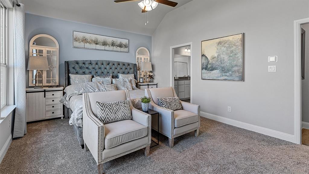 3280 Pier View Street Midlothian, TX 76065 - Photo 15 of 37 a spacious bedroom with a bed and a couch
