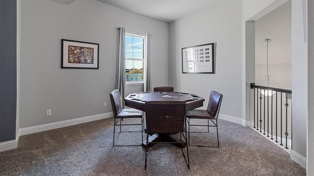 3280 Pier View Street Midlothian, TX 76065 - Photo 25 of 37 a view of a dining room with furniture