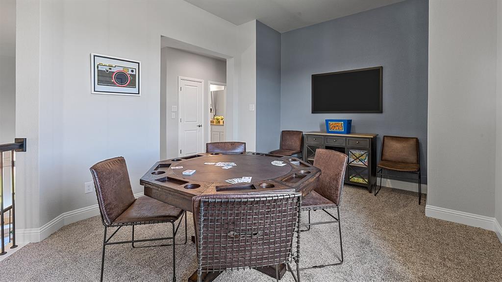 3280 Pier View Street Midlothian, TX 76065 - Photo 26 of 37 a workspace with furniture and a flat screen tv