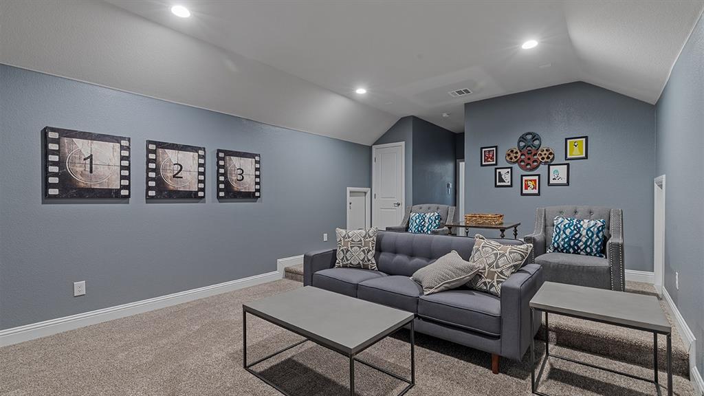 3280 Pier View Street Midlothian, TX 76065 - Photo 28 of 37 a living room with furniture and a couch