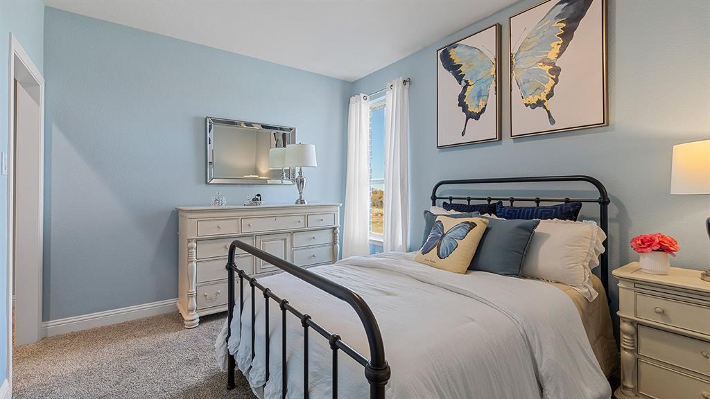 3280 Pier View Street Midlothian, TX 76065 - Photo 29 of 37 a bedroom with a bed and a stove