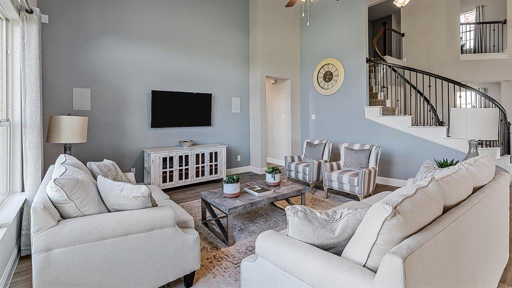 3280 Pier View Street Midlothian, TX 76065 - Photo 9 of 37 a living room with furniture and a flat screen tv