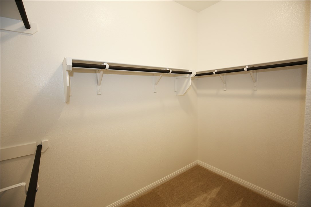 15912 Cessida Street Austin, TX 78728 - Photo 15 of 23 a view of small space with racks on the wall