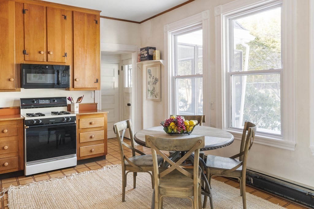 44 Mark Lee Road Needham, MA 02494 - Photo 13 of 33 a view of a dining room with furniture and a window