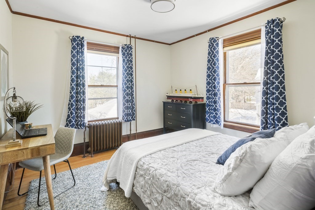 44 Mark Lee Road Needham, MA 02494 - Photo 17 of 33 a bedroom with a bed and a window