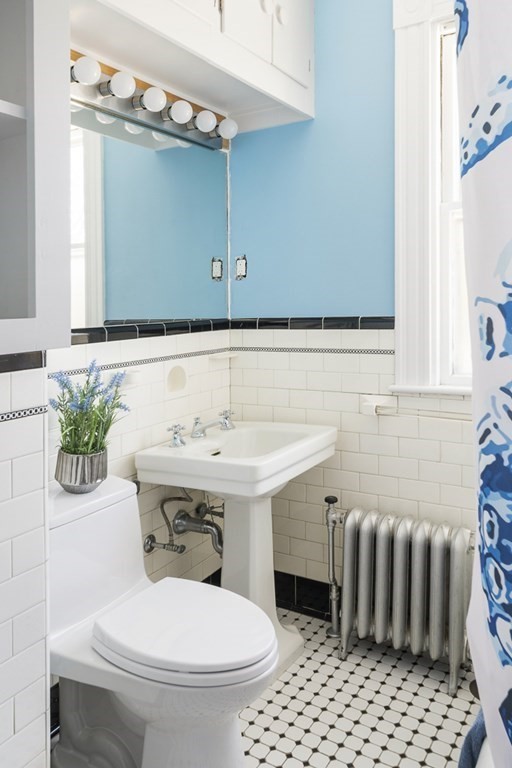 44 Mark Lee Road Needham, MA 02494 - Photo 20 of 33 a bathroom with a sink and a toilet