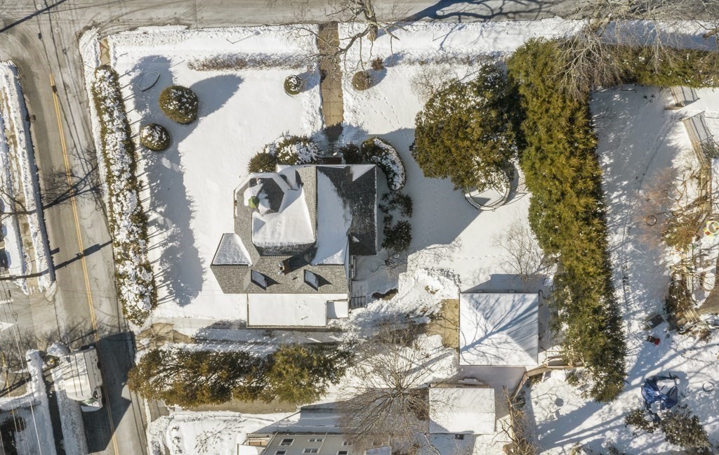 44 Mark Lee Road Needham, MA 02494 - Photo 27 of 33 a vase of flowers sitting on a table