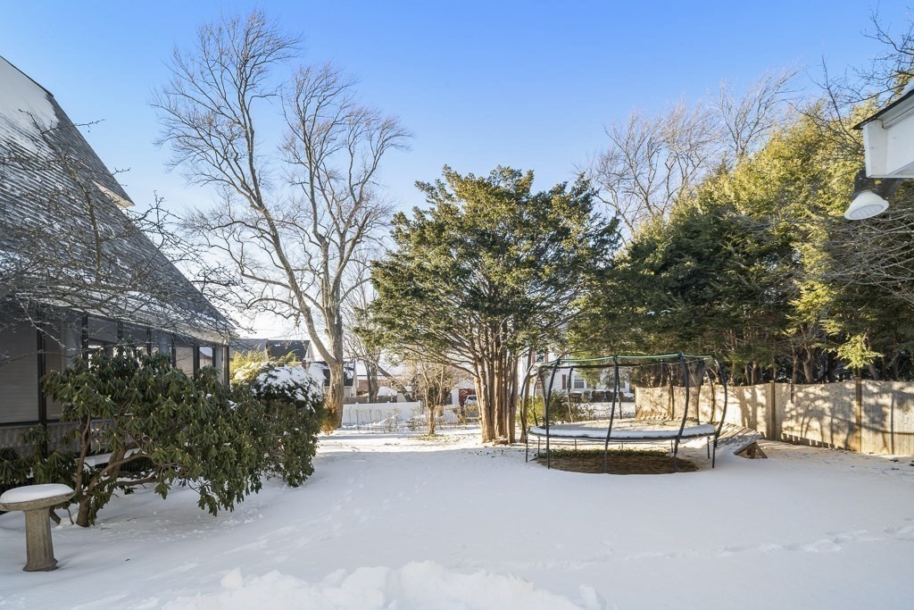 44 Mark Lee Road Needham, MA 02494 - Photo 29 of 33 a view of a house with a snow in the yard