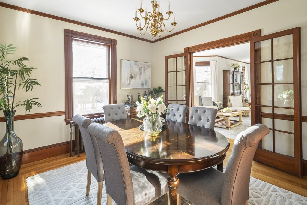 44 Mark Lee Road Needham, MA 02494 - Photo 10 of 33 a dining room with furniture a large window and wooden floor