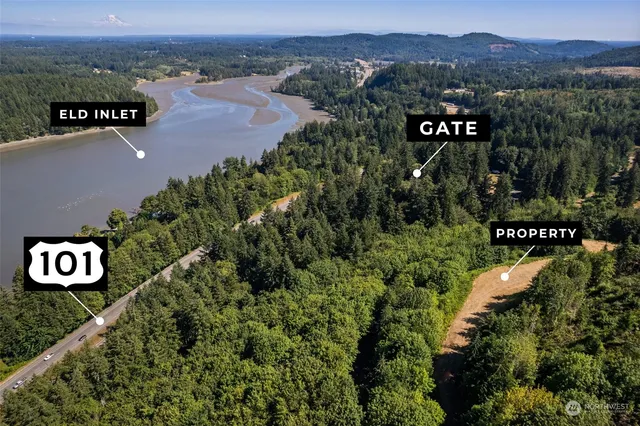 a view of a street with a building in the background