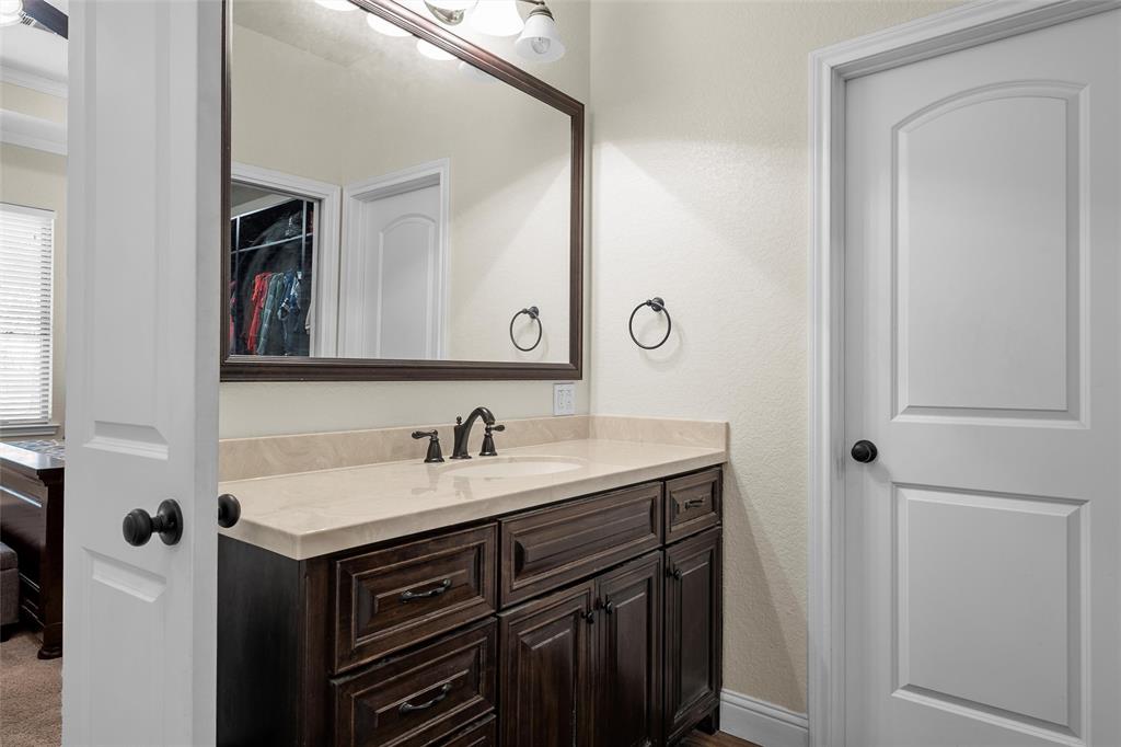 2743 Tokio Road West, TX 76691 - Photo 18 of 40 a bathroom with a sink and a mirror
