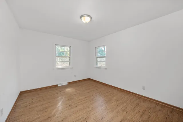 an empty room with windows