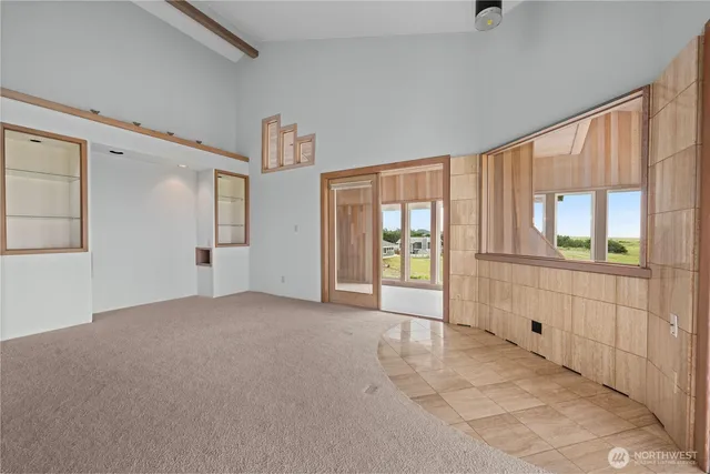 a view of bathroom with a sink and mirror