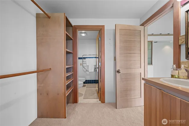 a view of an empty walk in closet