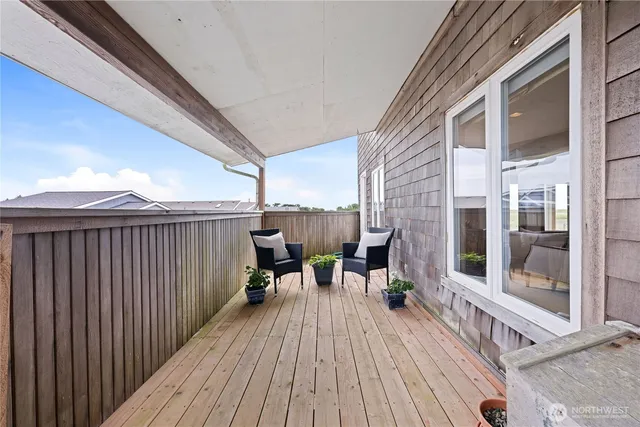 a view of roof deck with patio