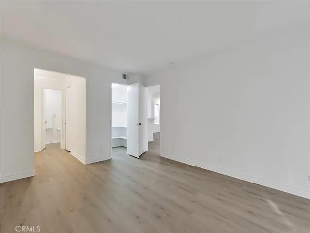 a view of a room that has a large window