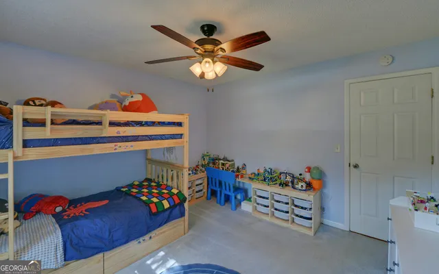 a room with toys and wooden floor