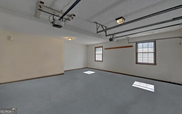 a view of a chairs and table on the deck