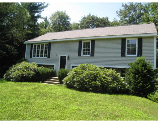23 Blacksnake Road Salisbury, MA 01952 - Photo 1 of 2 a front view of a house with a garden