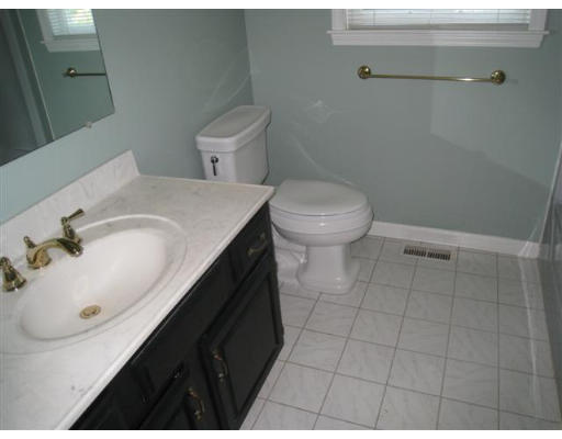 23 Blacksnake Road Salisbury, MA 01952 - Photo 2 of 2 a bathroom with a sink and a toilet