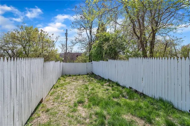 a view of a back yard of the house