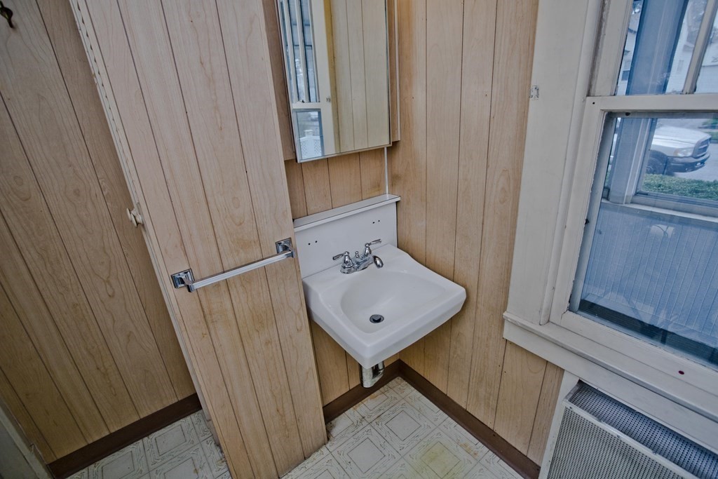 82 Redlands Street Springfield, MA 01104 - Photo 30 of 39 a view of a hallway with seating area