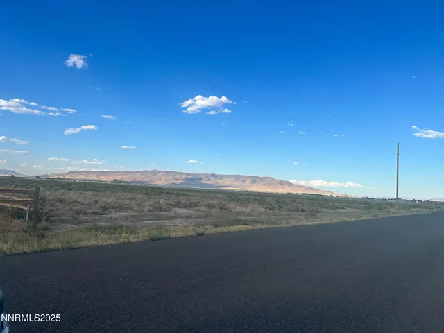 a view of an ocean and a building