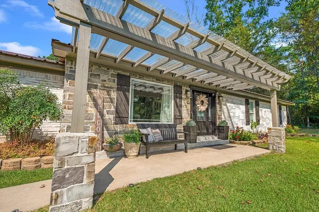 a house with garden in front of it