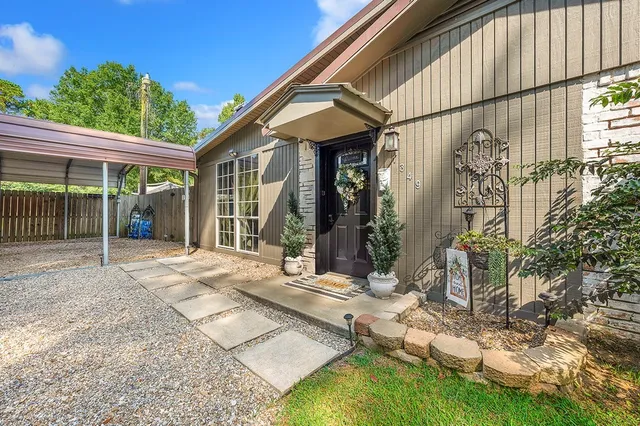 a view of house with a outdoor space