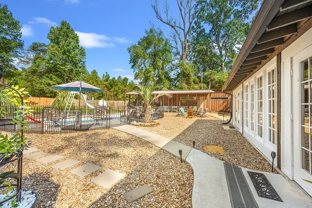 a view of balcony with furniture