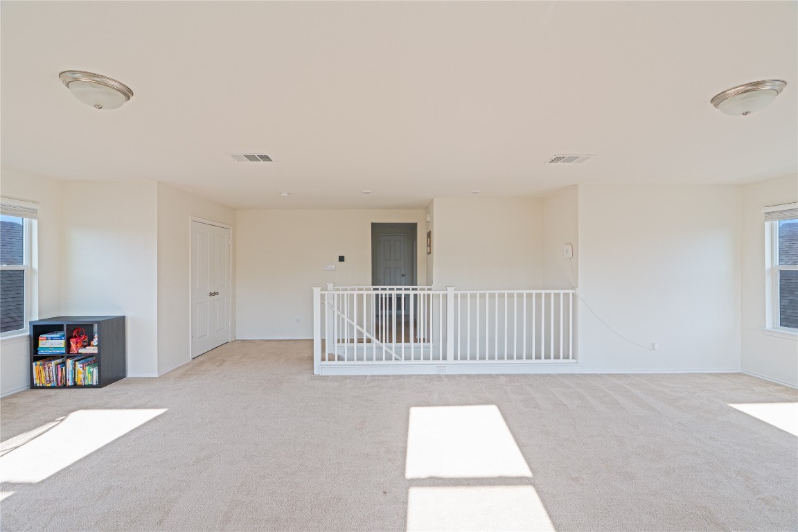 2950 East Old Settlers Boulevard, Unit 3 Round Rock, TX 78665 - Photo 17 of 28 a view of a livingroom with a fireplace