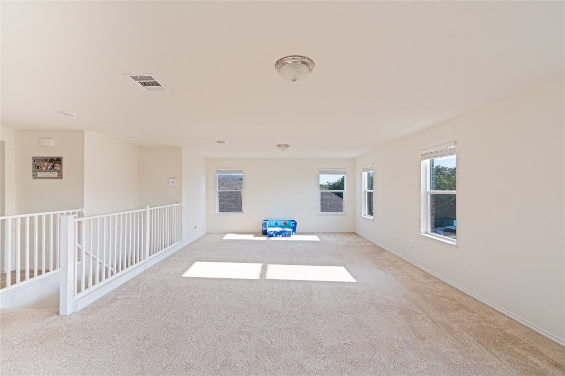 2950 East Old Settlers Boulevard, Unit 3 Round Rock, TX 78665 - Photo 18 of 28 a living room with furniture and a window