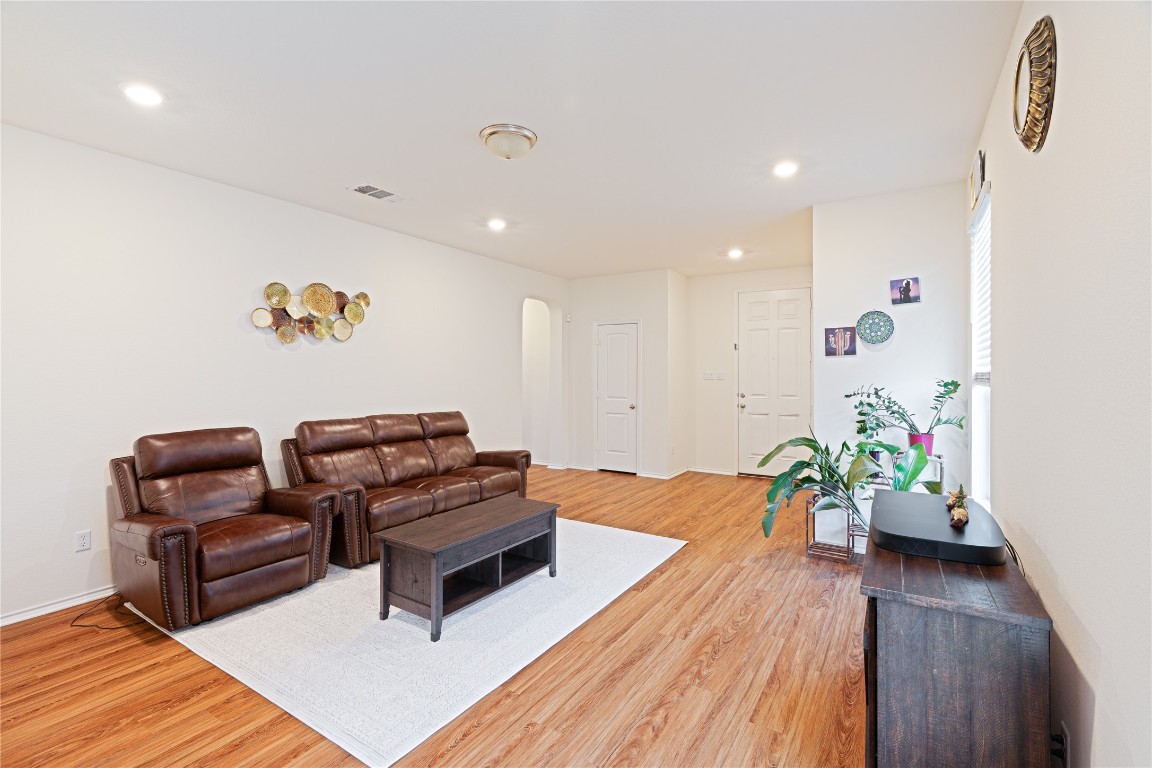2950 East Old Settlers Boulevard, Unit 3 Round Rock, TX 78665 - Photo 8 of 28 a living room with furniture