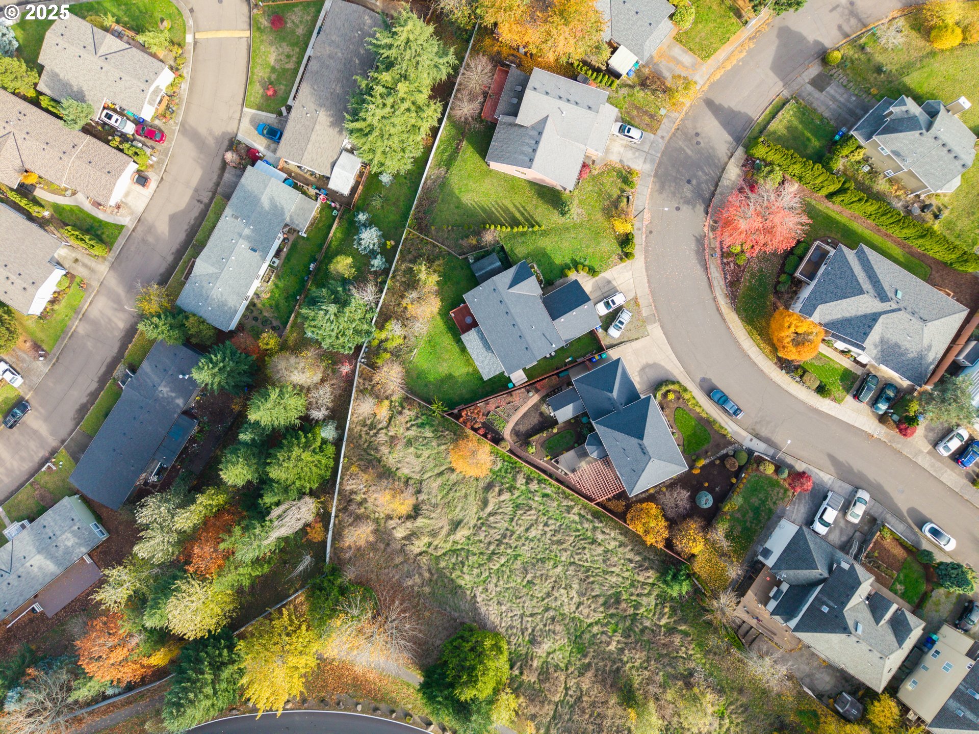 4235 Southeast Anderegg Loop Portland, OR 97236 - Photo 35 of 37 an aerial view of a house with a swimming pool