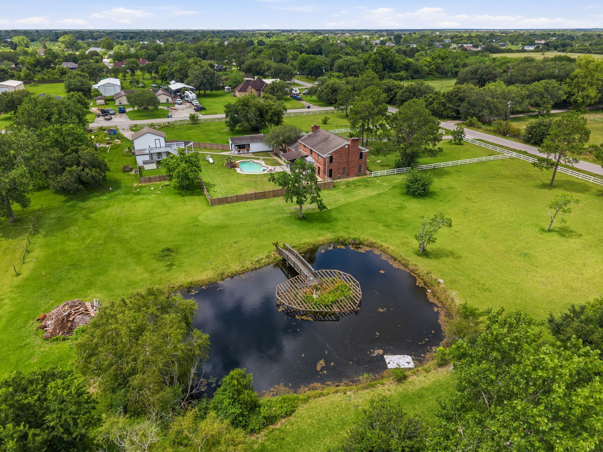 7009 Avenue R Santa Fe, TX 77510 - Photo 46 of 48 Property is fenced and cross fenced. Pond area has a bridge for fishing!