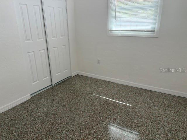 11601 109th Street Seminole, FL 33778 - Photo 18 of 29 an empty room with a window