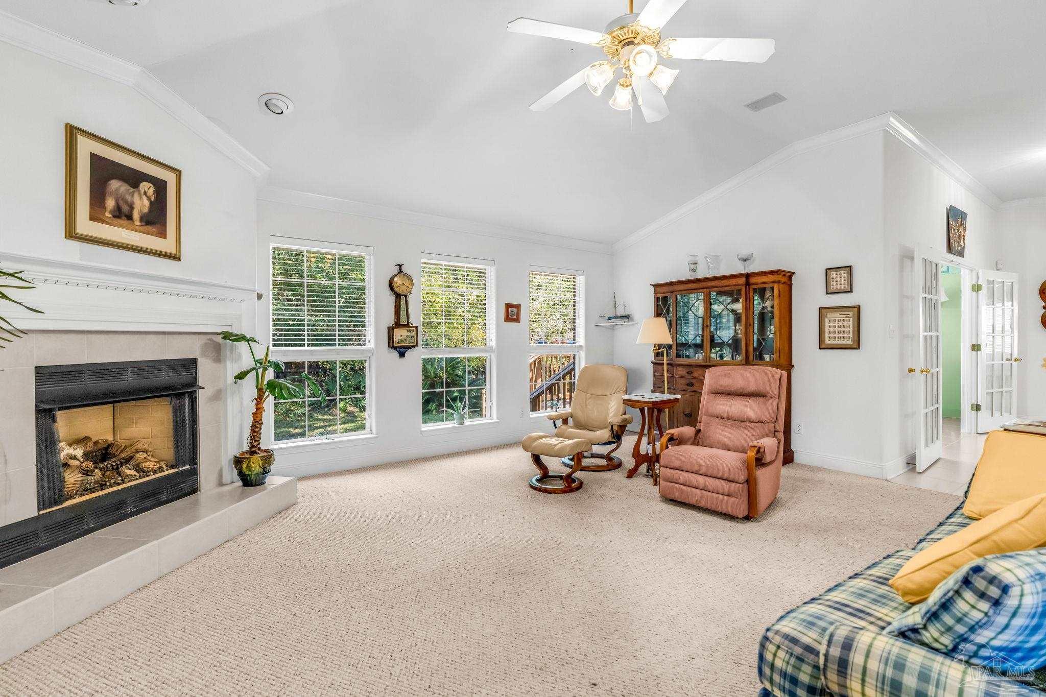 10149 Bittern Drive Pensacola, FL 32507 - Photo 16 of 56 a living room with furniture and a fireplace