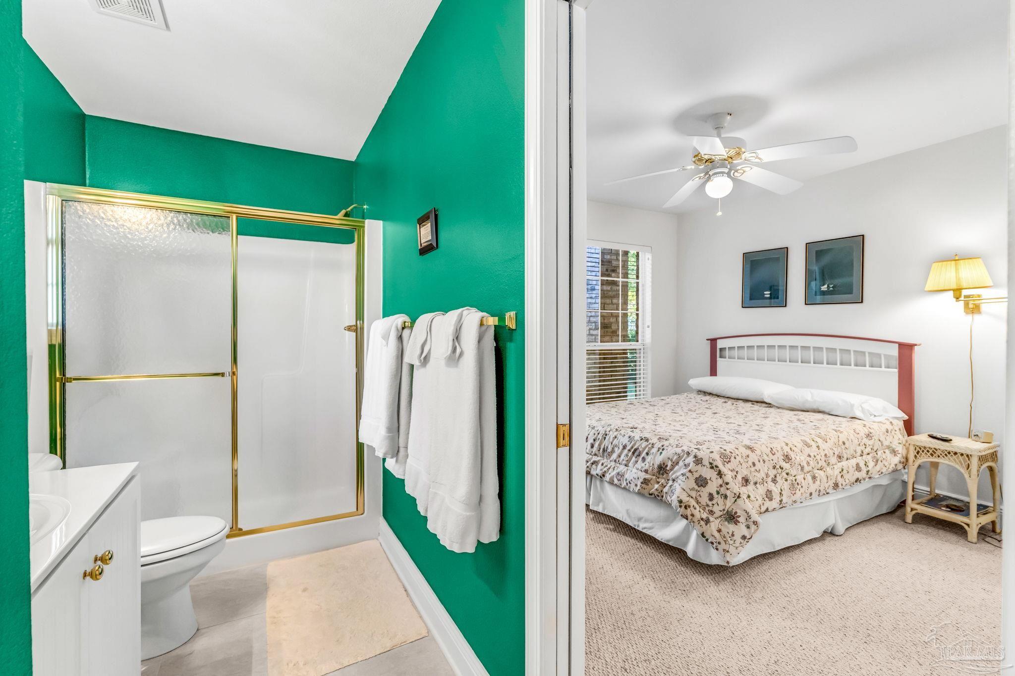 10149 Bittern Drive Pensacola, FL 32507 - Photo 32 of 56 a bedroom with a bed dresser and a window