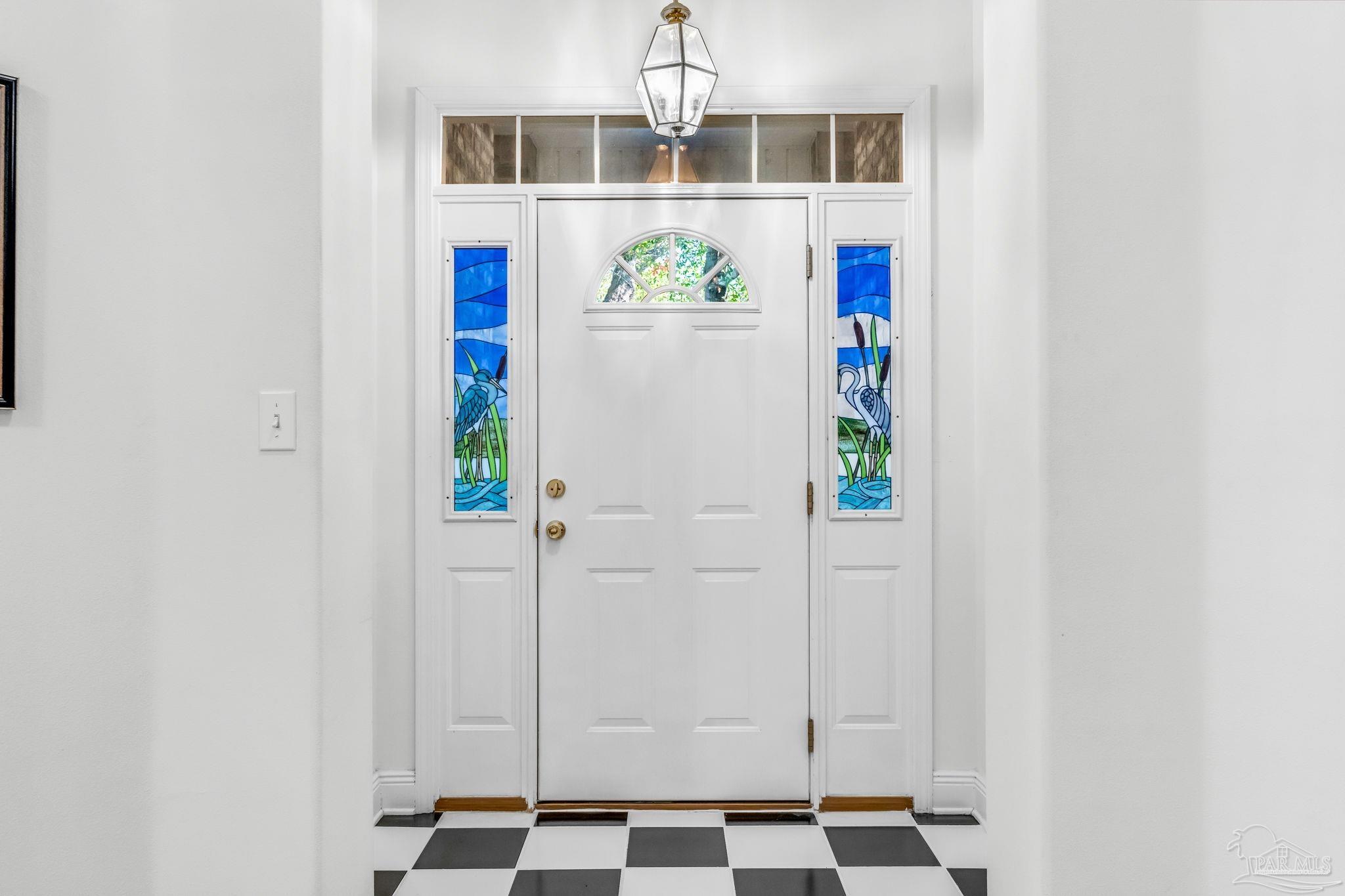 10149 Bittern Drive Pensacola, FL 32507 - Photo 6 of 56 a view of kitchen with refrigerator and window