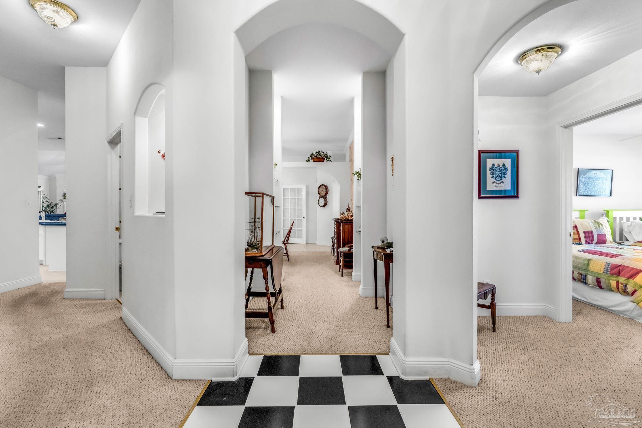 10149 Bittern Drive Pensacola, FL 32507 - Photo 9 of 56 a view of a hallway with a furniture and a livingroom view