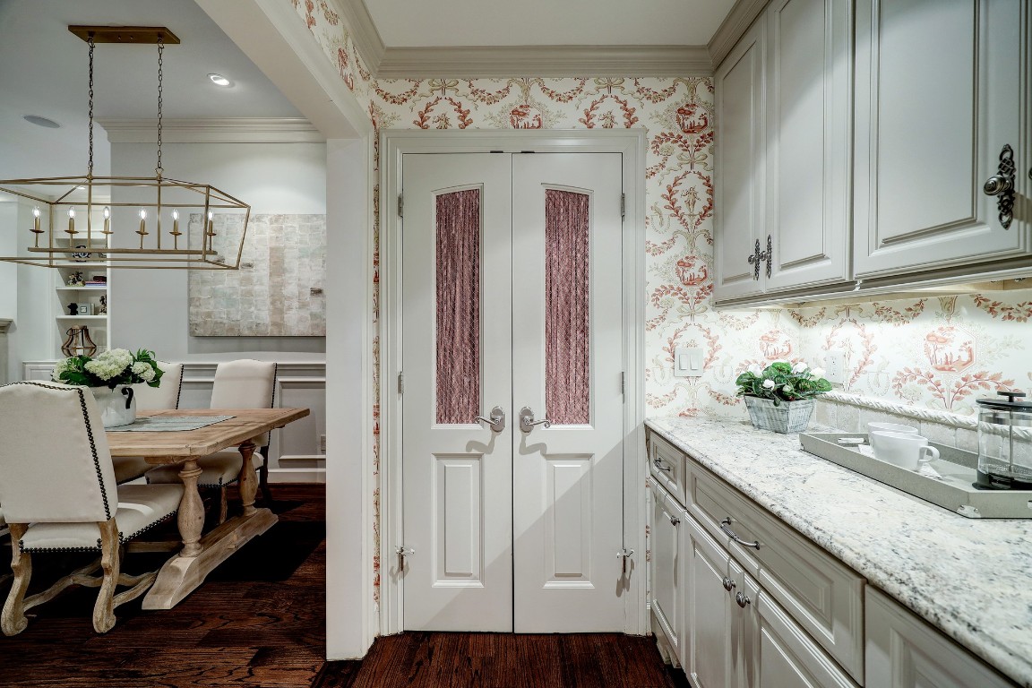 6599 Bayou Glen Road Houston, TX 77057 - Photo 16 of 41 Charming walk-in pantry gives ample storage off the butler's pantry and transitions seamlessly to the kitchen for great entertaining.