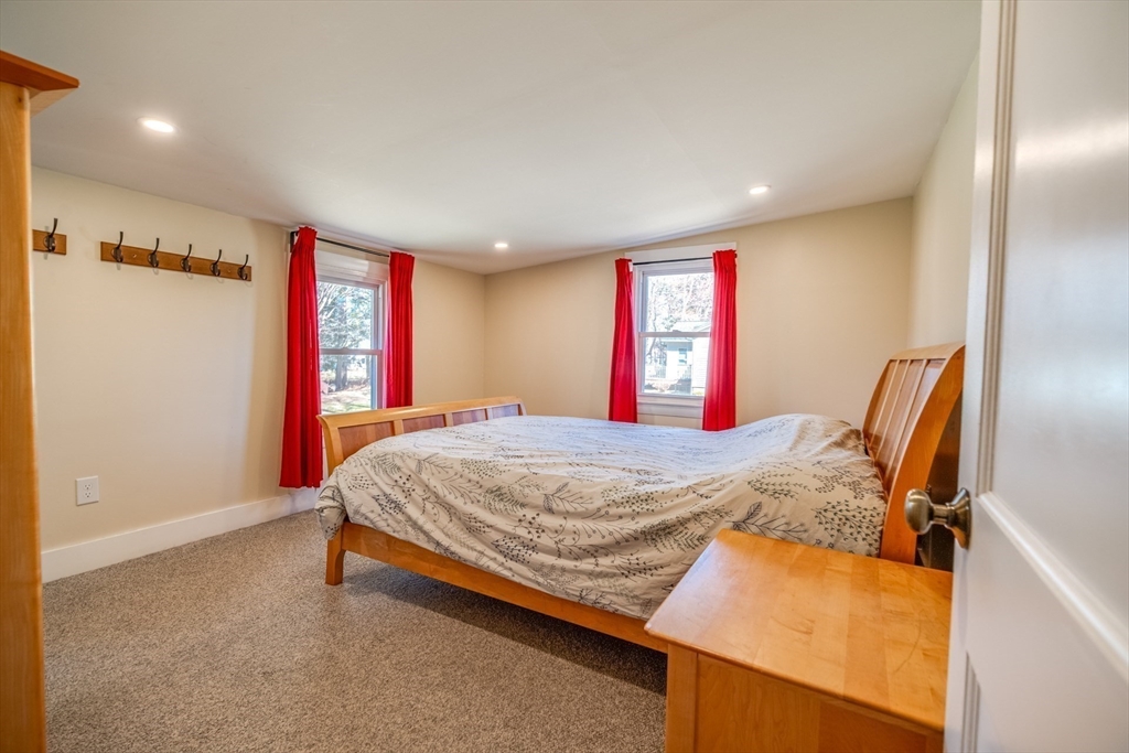 27 Bryan Avenue Easthampton, MA 01027 - Photo 27 of 39 a bed room with a bed and a dresser