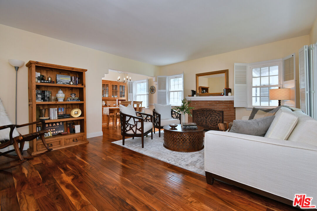 4226 Greenbush Avenue Sherman Oaks, CA 91423 - Photo 12 of 69 a living room with furniture and a fireplace