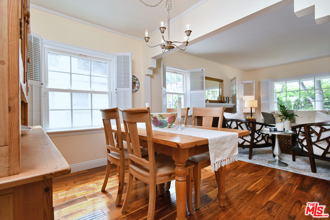 4226 Greenbush Avenue Sherman Oaks, CA 91423 - Photo 21 of 69 a view of a dining room with furniture and wooden floor