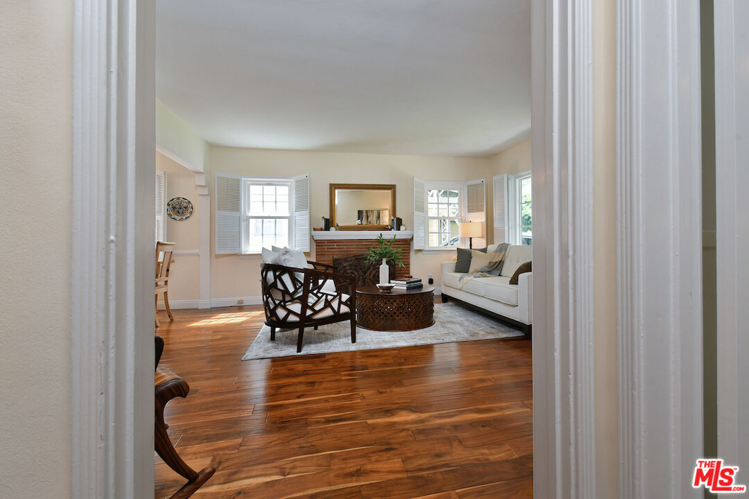 4226 Greenbush Avenue Sherman Oaks, CA 91423 - Photo 22 of 69 a living room with furniture and a wooden floor
