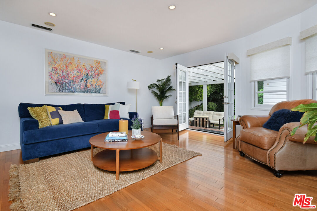 4226 Greenbush Avenue Sherman Oaks, CA 91423 - Photo 23 of 69 a living room with furniture and a large window