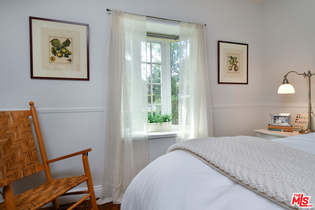 4226 Greenbush Avenue Sherman Oaks, CA 91423 - Photo 38 of 69 a bedroom with a bed and a window