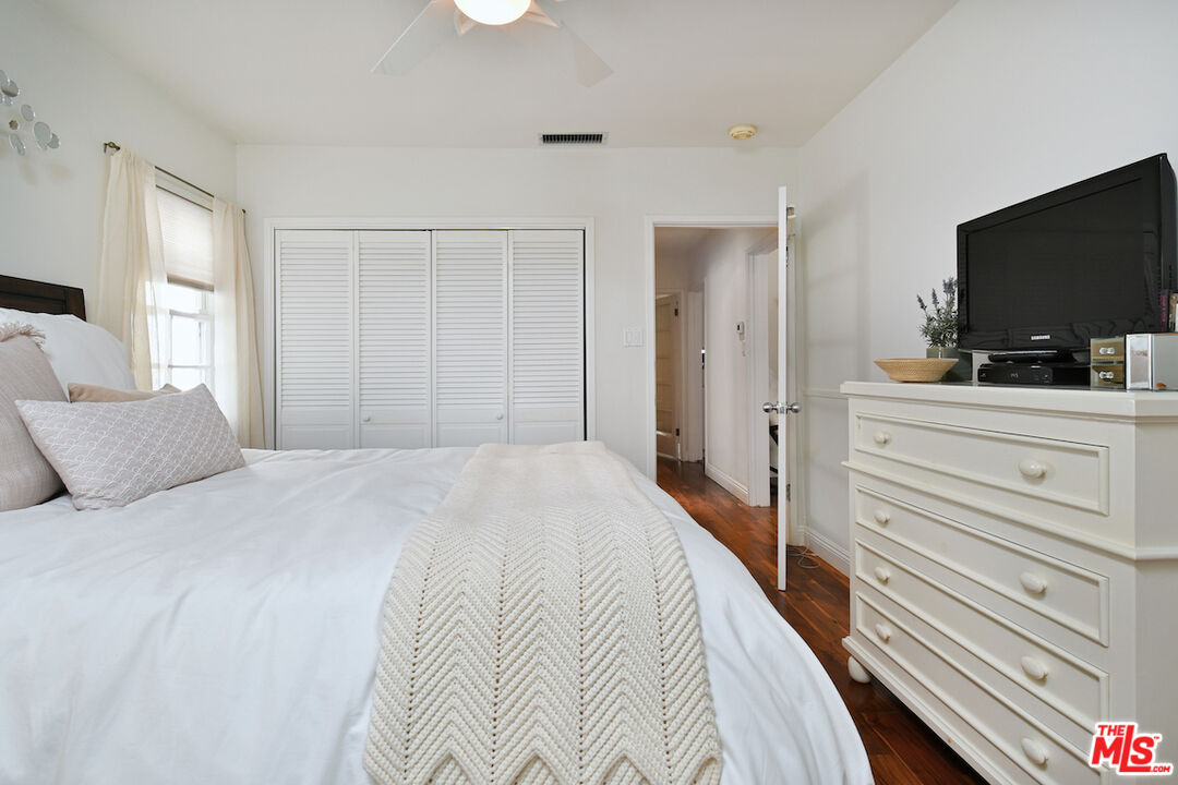 4226 Greenbush Avenue Sherman Oaks, CA 91423 - Photo 39 of 69 a bedroom with a bed and a flat screen tv